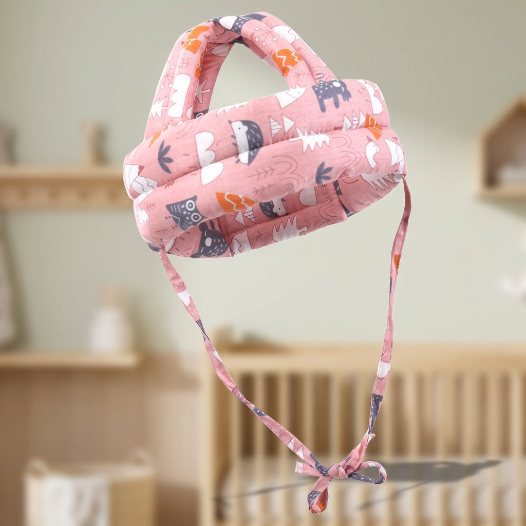 Pink headband with animal pattern on a light pink background